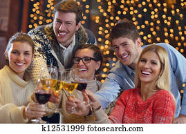 Group of happy young people drink wine at party Group of happy young people drink wine at party