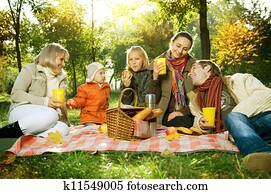 Happy Big Family in Autumn Park. Picnic Happy Big Family in Autumn Park. Picnic
