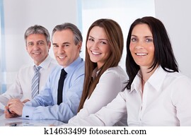 Happy Businesspeople In A Row