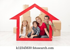 Happy family moving into a new home Happy family moving into a new home