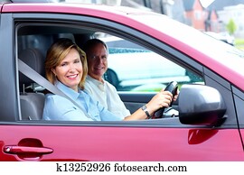 Happy senior couple in the car.