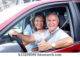 Happy senior couple in the car.