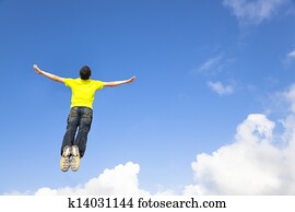 happy young man jumping 