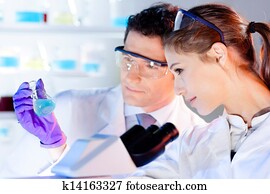 Health care professionals working in laboratory.