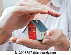 House in human hands
