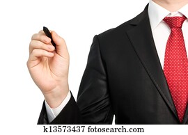 Isolated businessman in a suit with a red tie holding a pen