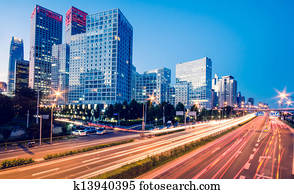 light trails on the modern city at dusk in beijing,China 