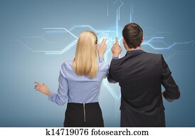 man and woman working with virtual screen