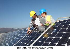 Man showing solar panels technology to student girl