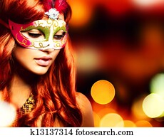 Masquerade. Beautiful Girl in a Carnival mask Masquerade. Beautiful Girl in a Carnival mask