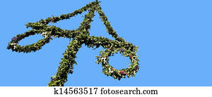 Maypole decorated with Swedish flag