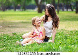 Mother and daughter in the park Mother and daughter in the park
