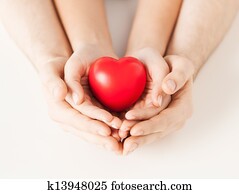 mujer y hombre, manos, con, corazón