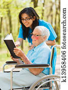 Nurse and Patient Reading
