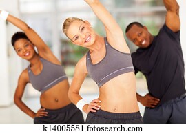 personal trainer exercise with two africans personal trainer exercise with two africans
