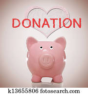 Piggy bank with heart and donation text Piggy bank with heart and donation text