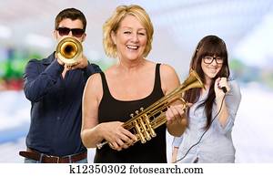 Portrait Of Happy Family Enjoying Music