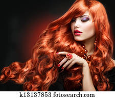 Red Hair. Fashion Girl Portrait. long Curly Hair 