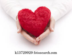 Red heart in woman hands Red heart in woman hands