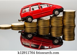 rising car costs. car on coins rising car costs. car on coins