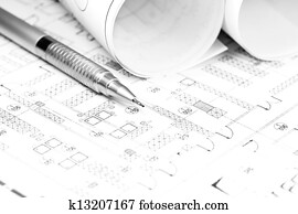 Rolled blueprint and pencil Rolled blueprint and pencil