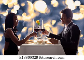 Romantic Couple Toasting Red Wine
