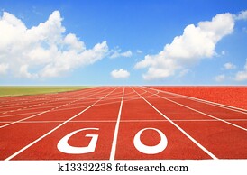 Running track with three lanes over sky and clouds 