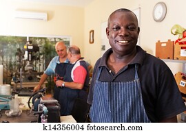 senior african metal worker in workshop senior african metal worker in workshop