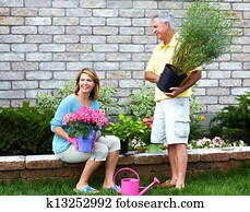 Senior couple gardening.