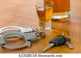 Shot glass with car keys and handcuffs Shot glass with car keys and handcuffs
