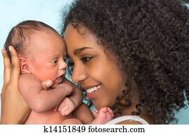 Smiling african mother and baby Smiling african mother and baby