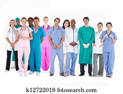 Smiling medical team of doctors nurses and surgeons