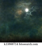 Spooky Halloween graveyard with dark clouds and ominous moon