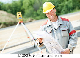 surveyor works with theodolite