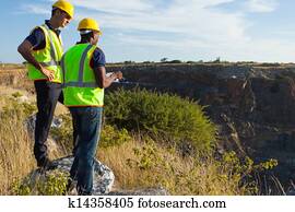 surveyors working at mining site surveyors working at mining site