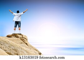 Winner man on mountain top Winner man on mountain top