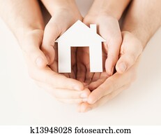 woman and hands with paper house woman and hands with paper house