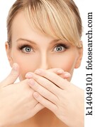 woman covering her mouth