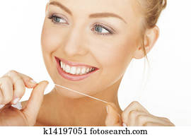 woman flossing woman flossing