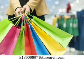 Woman holding shopping bags Woman holding shopping bags