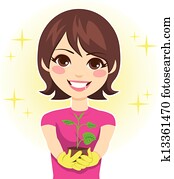 Woman Showing Plant Growth