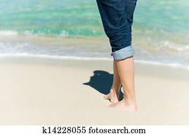 woman walking at the beach