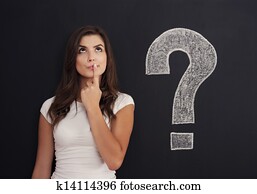 Woman with question mark on blackboard Woman with question mark on blackboard