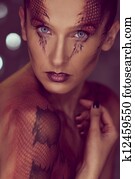 Woman with snake body-art Woman with snake body-art