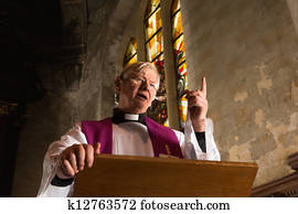 Stock Photography of Male Priest Stands at a Pulpit in a Protestant ...