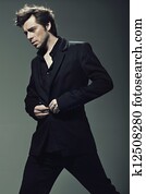 Young confident man wearing suit