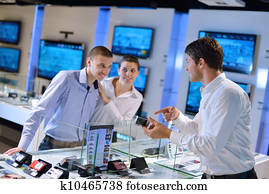 Young couple in consumer electronics store
