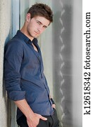 Young handsome man in blue shirt