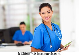 young medical worker holding tablet computer