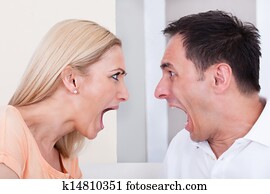 Angry couple shouting at each other